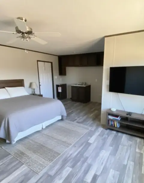 Suite bedroom of a 16×76 4-suite full-kitchen unit