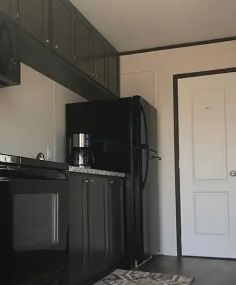 Suite kitchen of a 16×76 4-suite full-kitchen unit