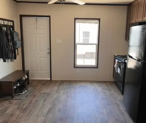 Private room of a 16×76 5-bed crew unit with shared kitchen