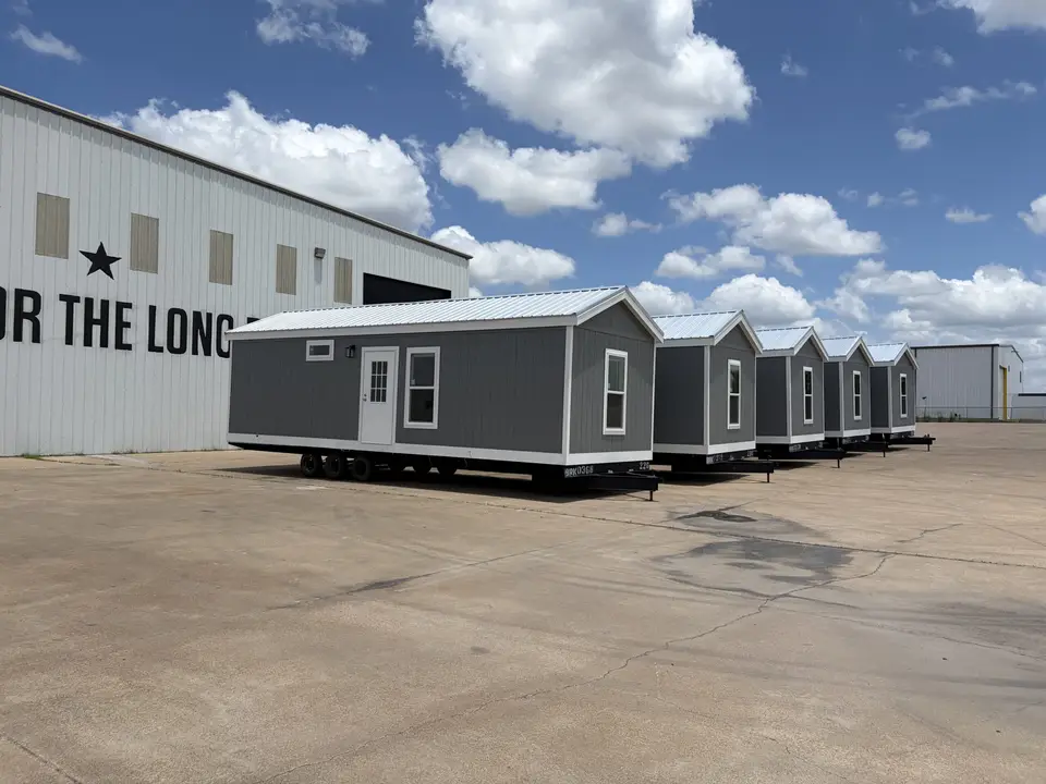 Row of factory-built crew housing units on a Texas job site