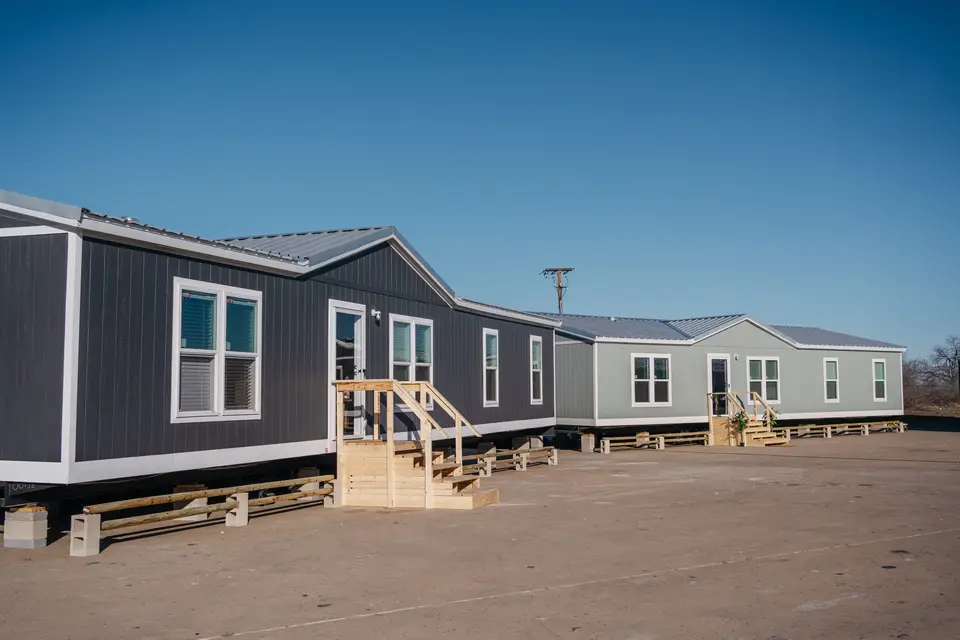 Row of factory-built crew housing units on a Texas job site