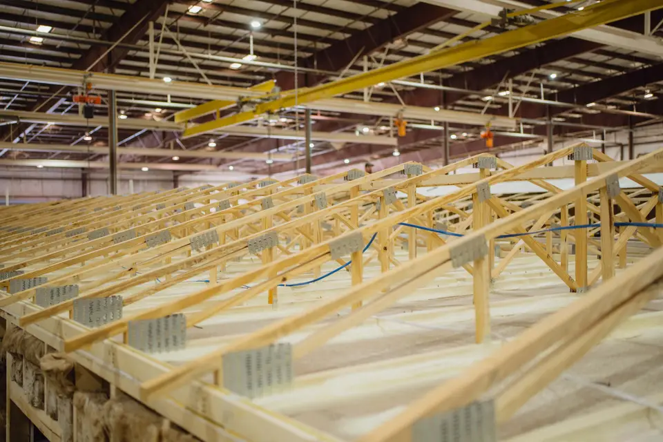 Housing unit being built and set by a Texas factory crew